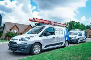 Airstream Services branded service vans parked in a Middle Tennessee neighborhood for HVAC, plumbing, and electrical appointments