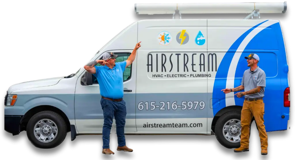 Two Airstream Plumbing, Heating & Air technicians playfully pose in front of their branded service van.