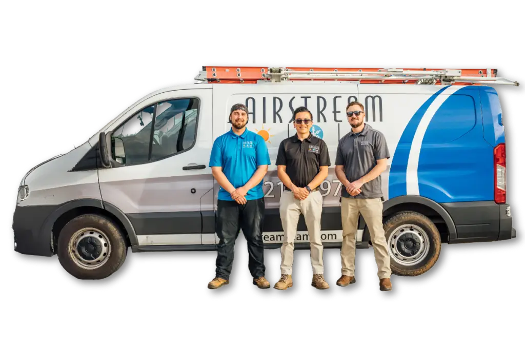 Three Airstream Plumbing, Heating & Air technicians standing in front of a branded service van.