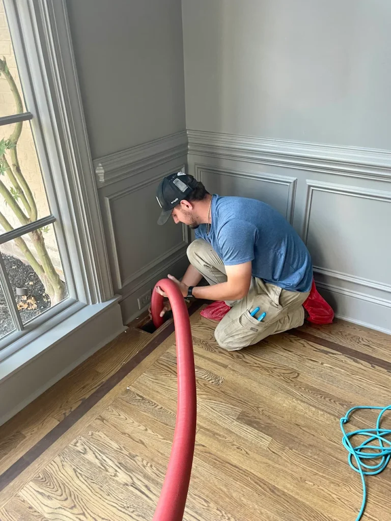 Airstream Services tech performing a duct cleaning service